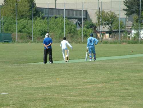 Dharminder Raulia bowls for UNCC